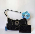Coach Soho Signature Baguette Bag with a small purse